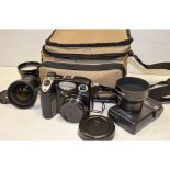 Nikon Coolpix 5000 Digital Camera, together with various Nikon lens attachments, a Lowepro memory