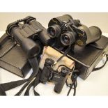 Swift Audubon Extra Wide Field Binoculars, 8.5x44 in leather case, together with a pair of Minox