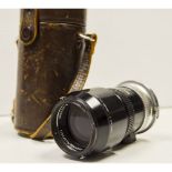 Nikkor-Q 13.5cm f/3.5 Lens, first black type with spring clip hood and cap in maker's leather