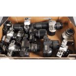 A Tray of SLR Cameras, including a Minolta XG 9, Praktica Super TL, Canon EOS and more
