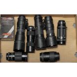 Telephoto Zoom Lenses, examples including a Nikon AF 75-300mm f/4.5, Sigma 70-300mm f/4 AF, boxed