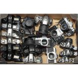 A Tray of 35mm SLR Cameras and Bodies, models including Olympus OM-1, Canon AV-1, Pentax ME Super,