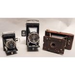 Kodak Volenda 620 Folding Camera, Anastigmat 10.5cm f/4.5 together with a Kodak Eastman Hawkette
