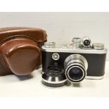 A Corfield Periflex 1, chrome, with Lumar-X 50mm f/3.5, lens hood and manufacturer's leather case