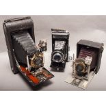 Folding Cameras, a Kodak Vest Pocket Camera, a Zeiss Ikon Nettar and an unmarked quarter-plate