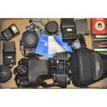 A Tray of Praktica Items, including a BMS and a BV20 SLR, binoculars, flash guns and more