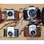 Ihagee SLR Cameras, including an Exa500, Type4, and a Type 6, some examples including maker's cases