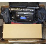 A Panasonic NV-VX5, VHS C camcorder complete with tapes, A/V cables and charger