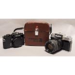 Nikkorex Zoom 35 Camera, Zoom-Nikkor 43-86mm f/3.5 lens in maker's leather carry case together
