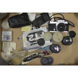 A Nikkormat FT2 SLR Camera, no 5464297 with a Nikkor 50mm f/2, a pair a zoom lenses, filters and