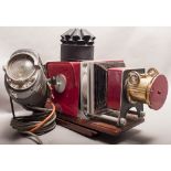 Magic Lantern Projector, a modern example together with a Cremer spot light with cracked lens