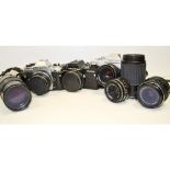 SLR Cameras, Nikon FG with a series E 50mm f/1.8 lens, a pair of Prakticas (PLC3 & B200) together