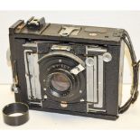 Van Neck Press Master, 5x4 strut folding camera with a Ross Xpres 6" f/4.5 lens and focal plane