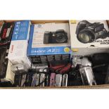 Digital Bridge Cameras, including a Nikon Coolpix 880, a Konica Minolta Dimage A2 (boxed), Canon