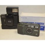 A Ricoh R1 Compact Camera, with f/3.5 30mm lens complete with instructions and leather case,