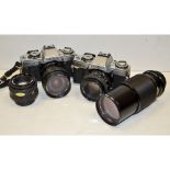 Minolta XG-M SLR Outfit, two bodies, both with 50mm f/1.7 prime lenses, together with an