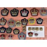 A collection of cloth and bullion Warrant Officer badges, including Women's Royal Army Corps,