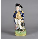 A 19th Century character toby jug, modelled as Admiral Lord Nelson standing with tricorn hat,