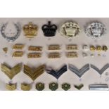 An assortment of title, rank and collar badges, comprising Yorkshire Volunteers, Army Junior