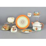 A Shelley Mabel Lucie Atwell Pixie Cottage Teapot, a Shelley drip glaze muffin dish base, a honey