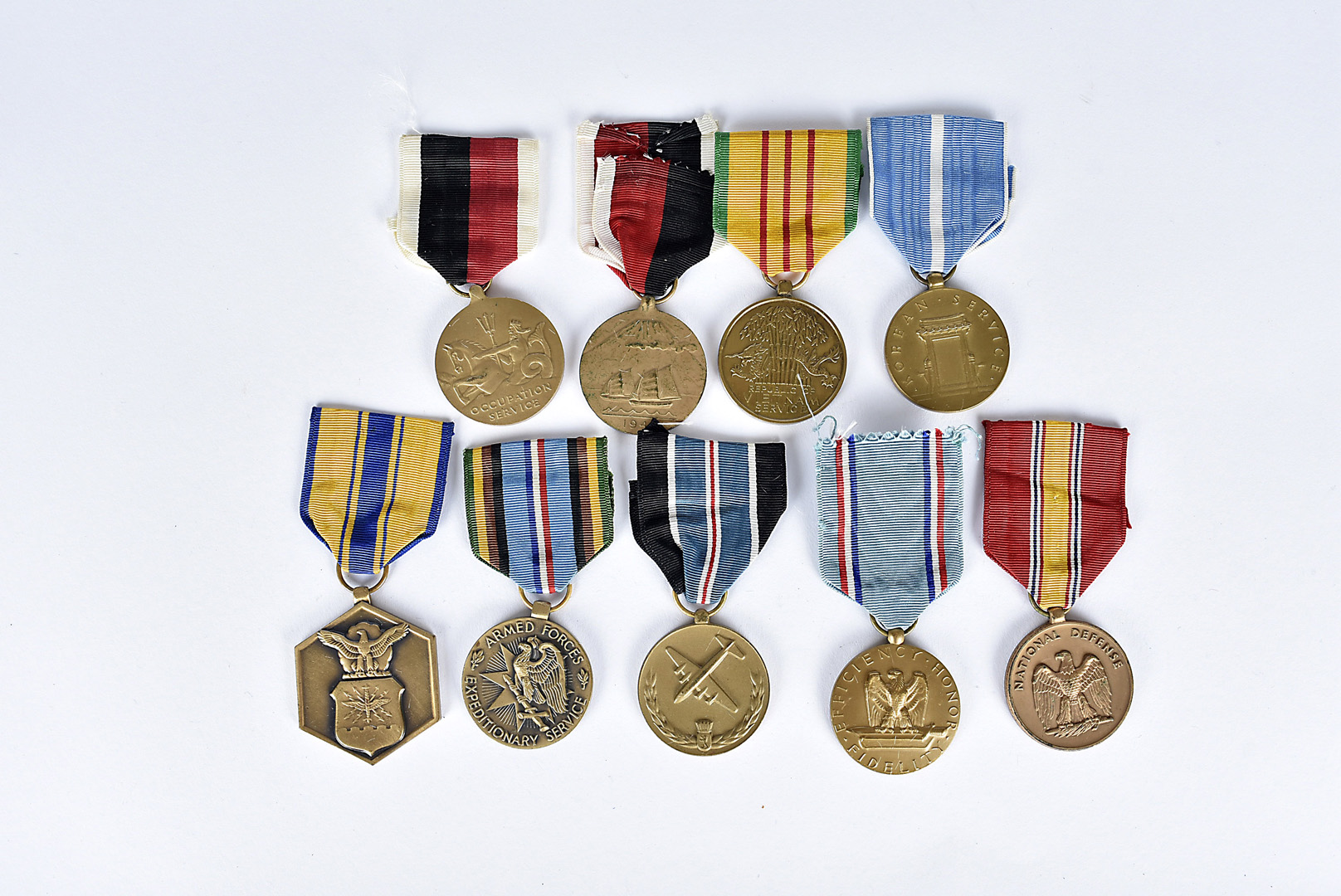 An assortment of American military medals, comprising Army of Occupation medal, Navy Occupation