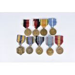 An assortment of American military medals, comprising Army of Occupation medal, Navy Occupation