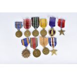 A Group of nine WWII period American medals, comprising the Silver Star, the Bronze Star, the Air