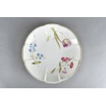 A 19th Century Swansea porcelain moulded floral painted dish, having three individual sprays of