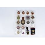 An assortment of Welsh and Overseas Fire badges, comprising Romanian 5,10,15 and 20 Years Service,