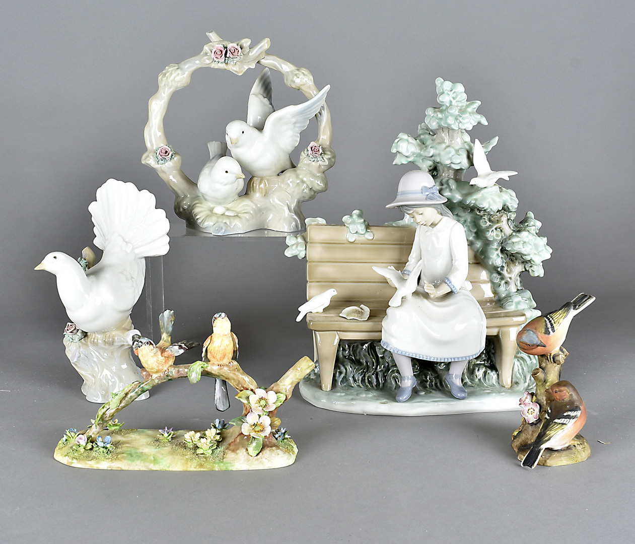 A Royal Crown Staffordshire porcelain figure group, by G T Jones, a Royal Worcester figure group