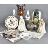 A quantity of British and European ceramics, including two copper lustre jugs, two German figures of