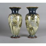 A pair of art nouveau ovoid Royal Doulton, with tubelined stylised blue apple blossom decoration, by