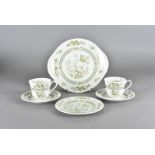 A Royal Doulton six place tea service, Tonkin pattern, six cups and saucers, side plates and a bread