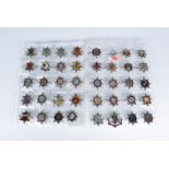 An assortment of 40 British City and County Fire badges, comprising British Aerospace, Hampshire,