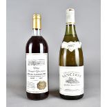 A bottle of 1987 Domaine Du Paradis Sancerre wine, together with a bottle of Clos Saint-Georges