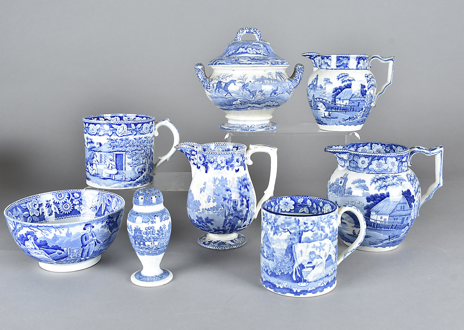 A collection of early 19th Century blue and white transfer printed English pottery, including a