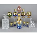 A set of six bohemian coloured harlequin glasses, with matching decanter together with a spiral