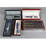 A Parker fountain pen in black and stainless steel, cased, a Parker harlequin propelling pencil in