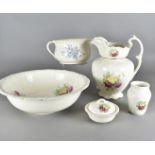 An Adderley's Ltd art deco jug and basin wash set, with stylised fruit and mauve rim together with