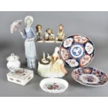 A collection of modern 20th Century ceramics, including a Lladro figure of an elegant lady with