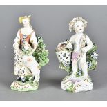 An early 19th Century Derby figure of shepherdess and lamb, against a floral bocage marked no 60