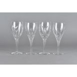 A set of twelve Royal Doulton hand cut crystal glasses, together with a set of six John Rocha