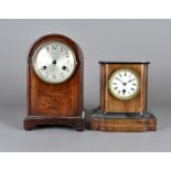 Two Edwardian mantel clocks, one in walnut veneer with 30 hour movement, 21 cm high the other