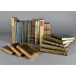 A collection of bound volumes, including Westwood Ho, Vanity Fair, Lord Byrons Works etc