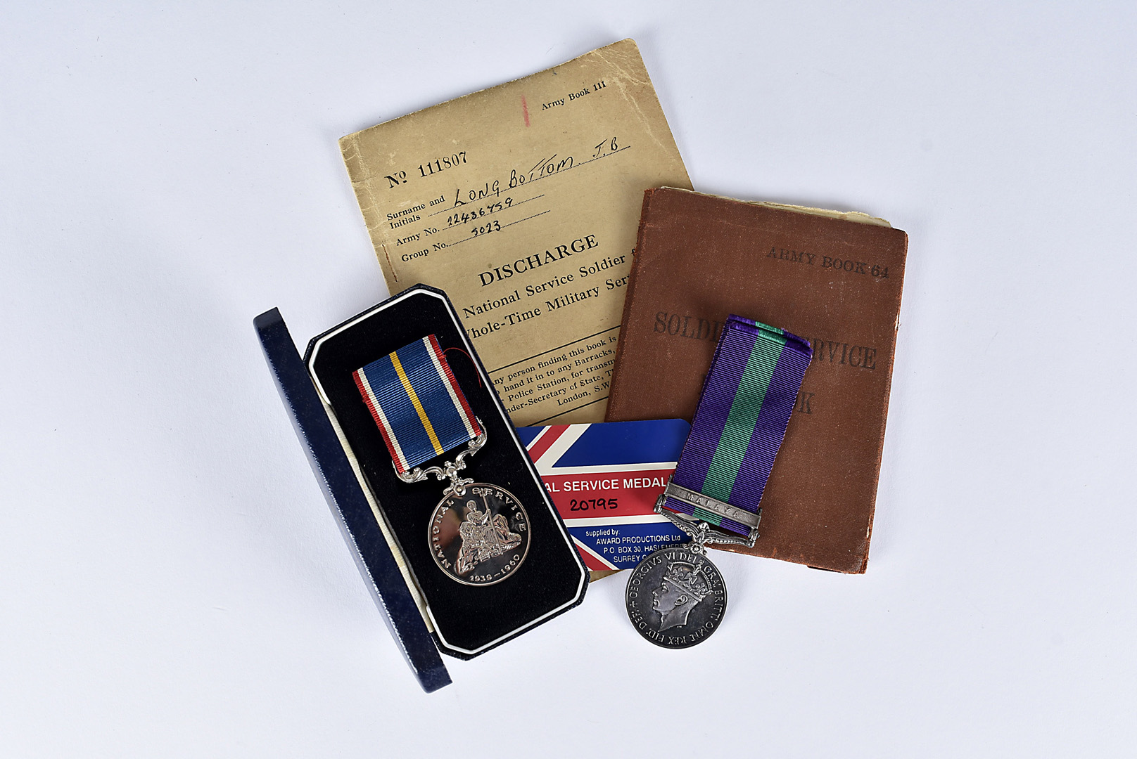 A Royal Signals General Service medal 1918-62, with Malaya clasp, awarded to 22436759 SIGMN.J.B.