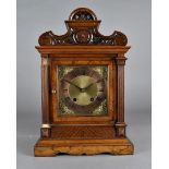 A 19th Century walnut mantel clock, with brass and copper dial, eight day movement, 44 cm high x