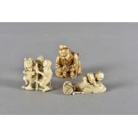 Three 19th Century Japanese ivory carved netsukes, one modelled as a monkey god carrying a young