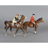 Two Beswick equestrian figures, including a Huntsman atop horse (af) and a Jockey marked 24