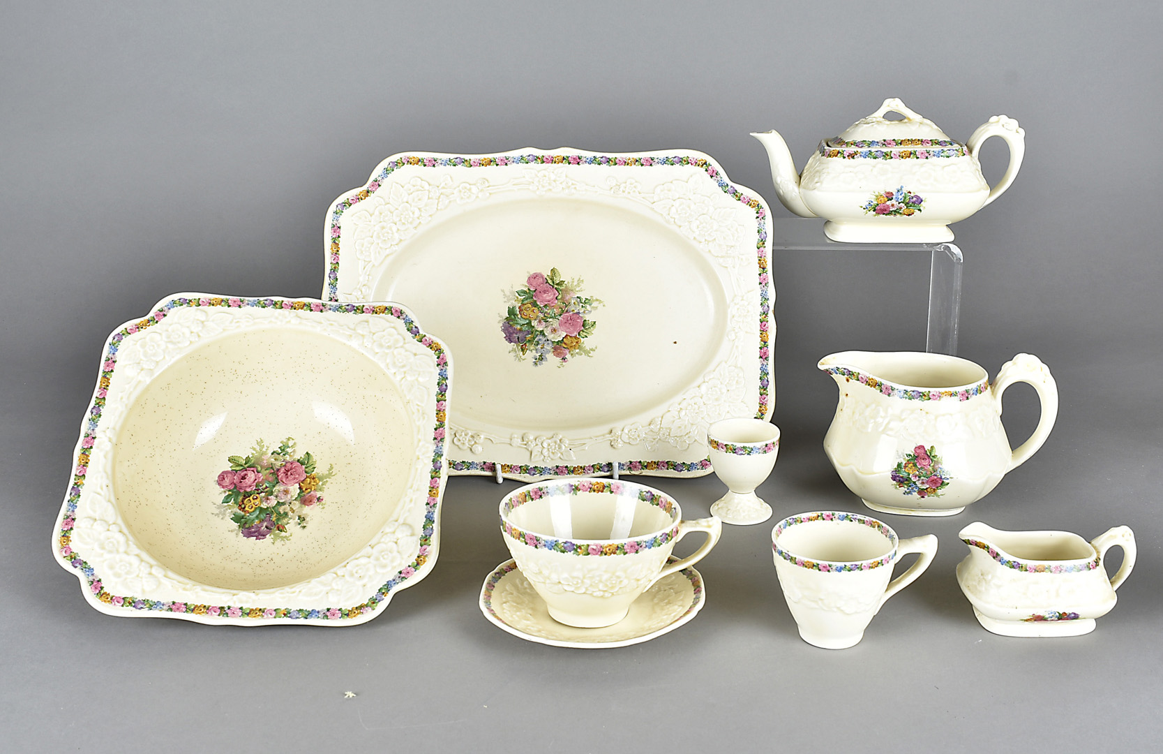 An art deco part Crown Ducal dinner, tea and coffee set, including egg cups, serving bowls, butter