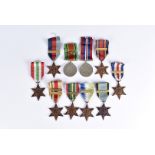 A extensive WWII medal group, comprising War and Defence medal, the 1939-45 Star with Battle of